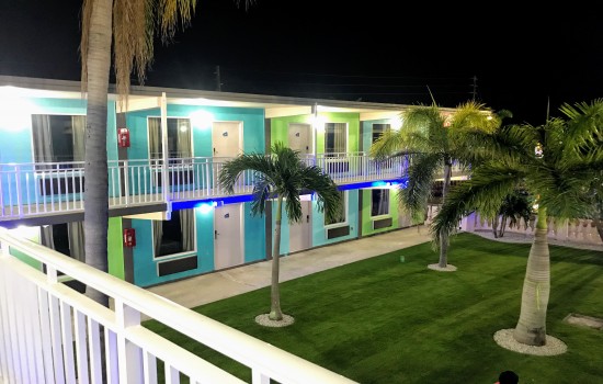 Welcome To Tropical Inn & Suites - Exterior View of Guest Rooms