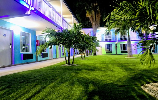 Welcome To Tropical Inn & Suites - Exterior View of Guest Rooms
