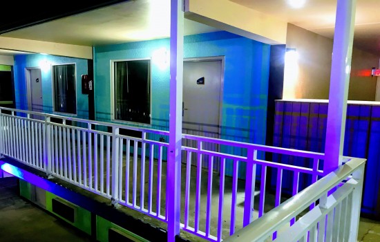 Welcome To Tropical Inn & Suites - Exterior Corridors 
