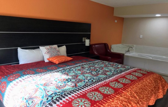Welcome To Tropical Inn & Suites - King Deluxe Guest Room