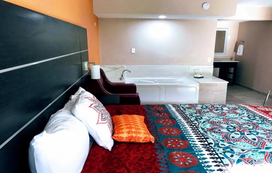Welcome To Tropical Inn & Suites - King Deluxe Guest Room