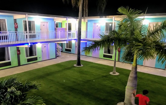 Welcome To Tropical Inn & Suites - Exterior View of Guest Rooms